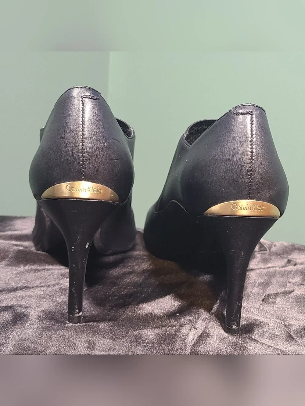 Calvin Klein Black Pointed-Heel Slip-On Pumps with Gold Zipper